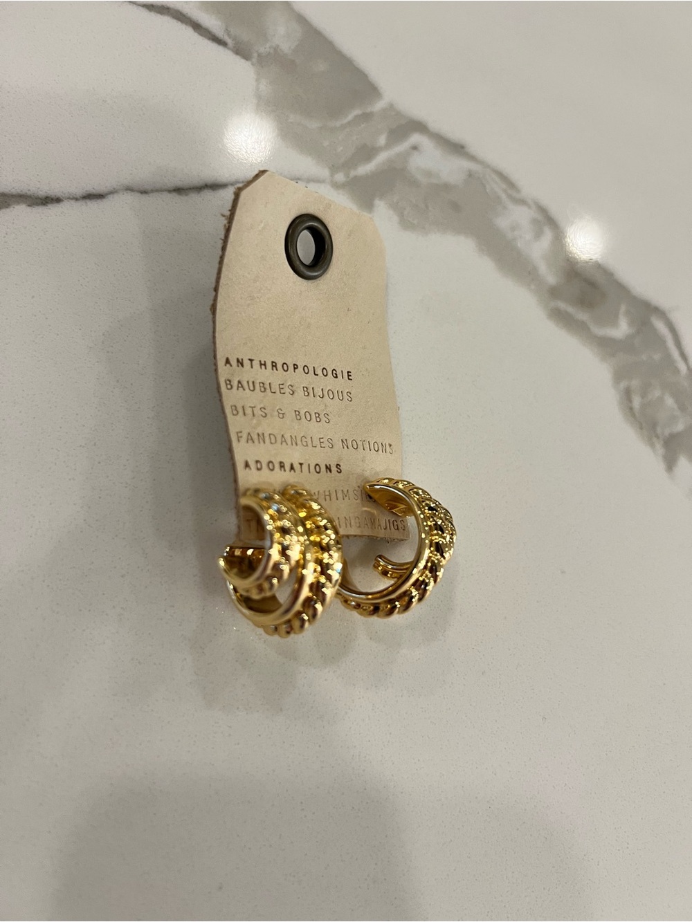 Anthropologie Shiny Gold Twisted Hoop Earrings